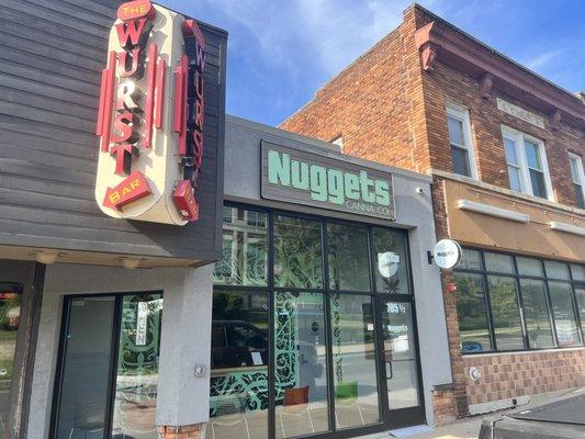 Exterior shot of NUGGETS next to Wurst Bar