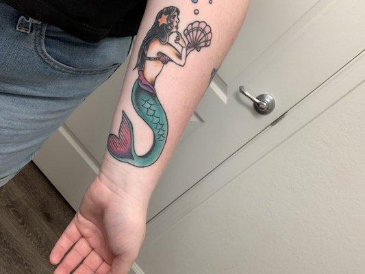 My coverup of my seashell tattoo. With the addition of a mermaid