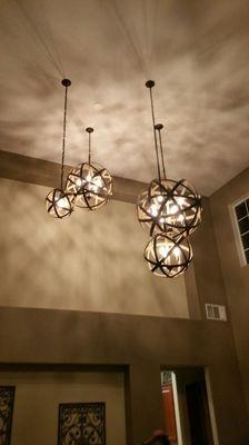 Four different size ball pendant lights