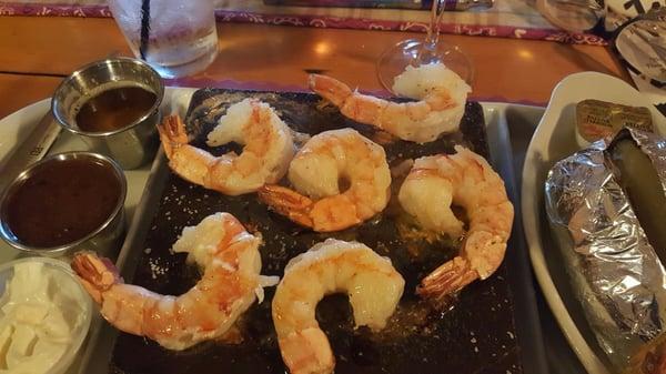 Delicious shrimp with a jerk dipping sauce that I poured on the rock while they sizzle.