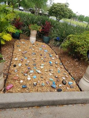 Put some painted rocks in memory garden