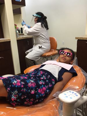 Irene getting her teeth cleaned.