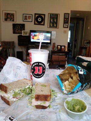 Turkey Tom Sandwich, Salt and Vinegar Chips, Diet Coke, Guacamole.