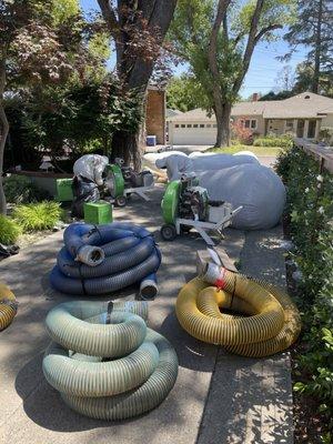 Clean up with bags of vacuumed old insulation