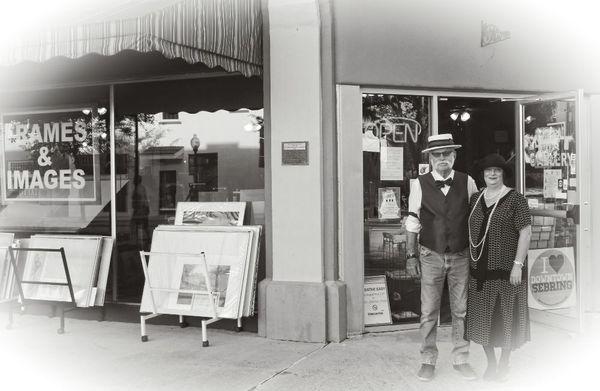 Mike and Vicki in front of their Store Frames & Images during a Roaring 20's in Downtown Sebring