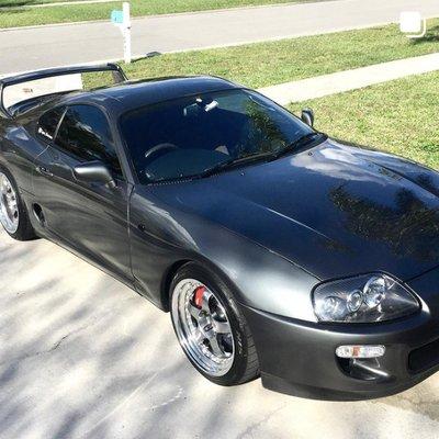 Full paint correction, and a 2 layer ceramic coating applied in this 94' Toyota Supra