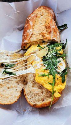 Omelet Smartwich, with egg, mozzarella, arugula, sauteed onions, and vinaigrette. One of the best egg sandwiches ever.