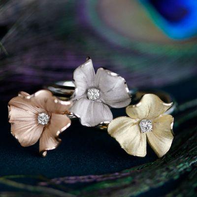 Annamaria Cammilli flower rings. Available in 8 colors of 18 karat gold.