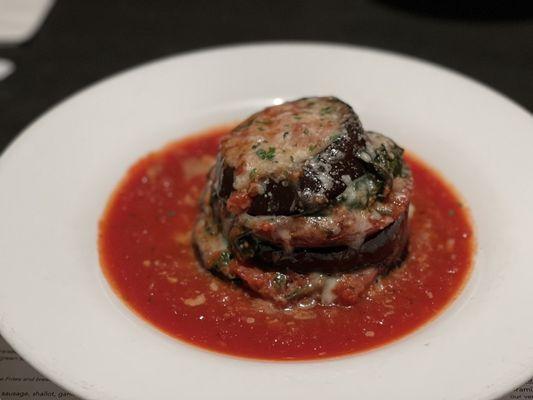 Melanzane- Layers of grilled eggplant, tomato, spinach, mozzarella, and grana padano cheese.