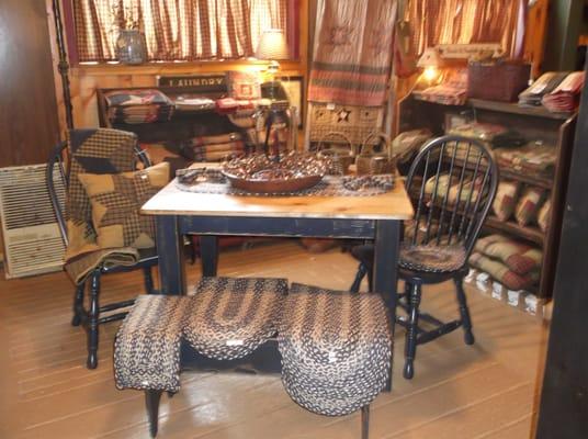 We carry handcrafted furniture as well as a complete line of primitive textiles and rugs.