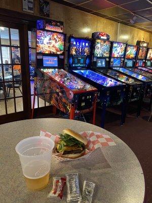 Cheeseburger, beer and pinballs