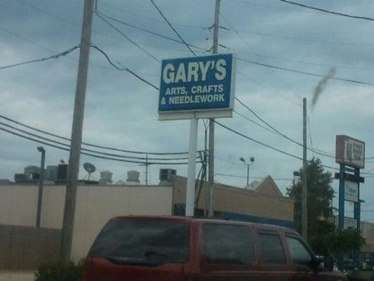 Sign for Gary's arts, crafts, and needlework