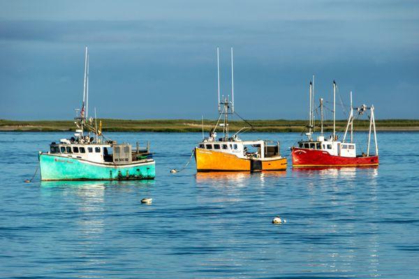 Three fishing boats in Chatham Harbor, Chatham, MA.