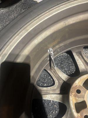 A Puncture by a pair of needle nose pliers