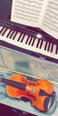 Piano & violin lessons. Very tired from practicing.