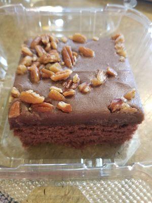 Trying the Texas chocolate cake with pecan