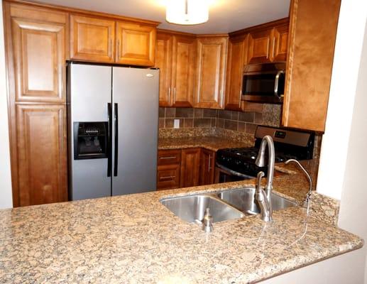 Complete kitchen remodel (cabinets, backsplash, granite counters)