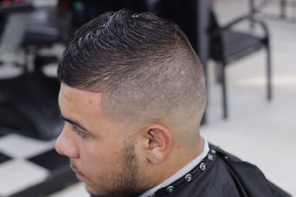 Skin fade comb over