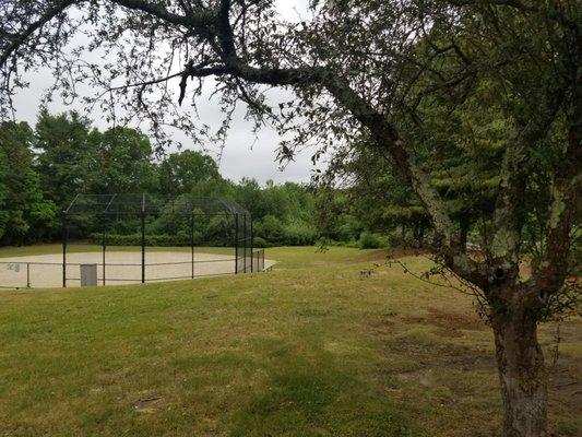 Grassy area around ball field. Also a short walking path around back fence of ball field.