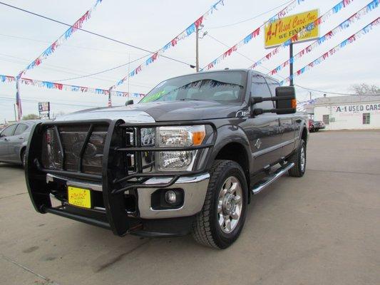 2013 Ford F-250 Lariat 4X4 6.7 Diesel Carfax One Owner with 129k miles.