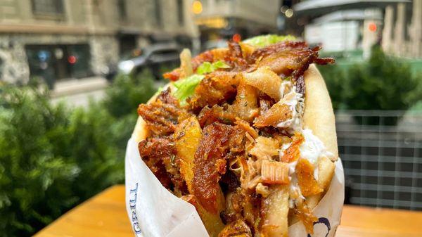 Pork belly yeero, lettuce, tomatoes, onions and French fries in a pita with tzatziki sauces , $10.95 + tax + tip