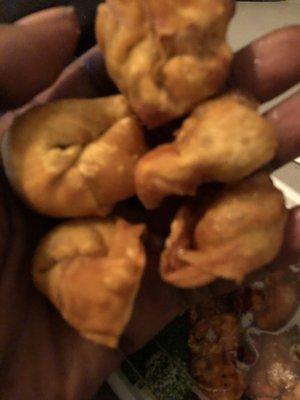 Fry wontons are mad hard and are not supposed to look like this and they taste nasty