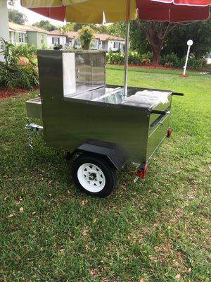 Check out the lowest price new hotdog cart on the Internet with the new rules 12 inch tires department of traffic with DOT approvals