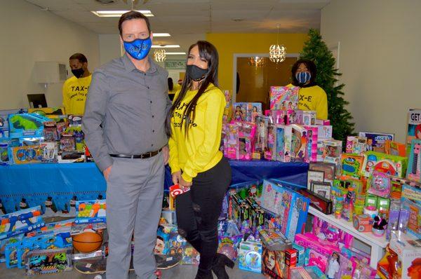 TAX-E's Annual Toy Drive 2020! Owner Priscilla Rainey and Senator Trey Paradee at the 2020 Annual Toy Drive.