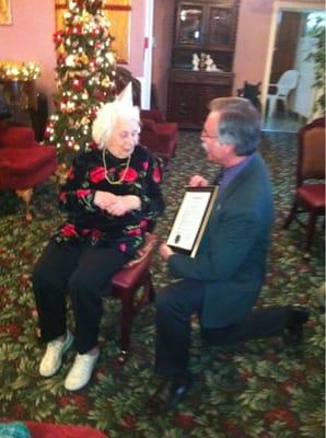 The mayor of Livermore presents QG resident Zori with best wishes for her 100th birthday!