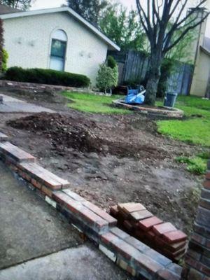 Driveway planters and grass removal for sod laying