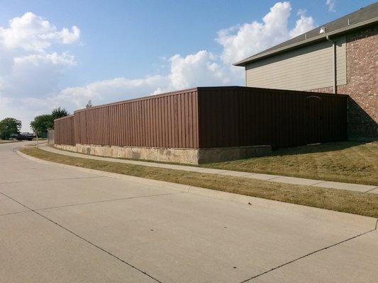 Frisco, TX retaining wall and 8' board on board western red cedar fence, power gate and windows, a satisfied repeat customer.