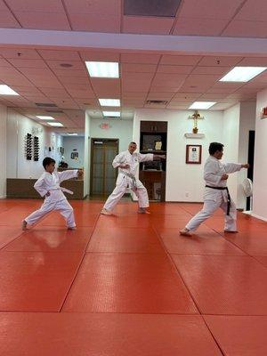 My son doing a Kata with a senior student. The students are very humble and welcoming to new students.