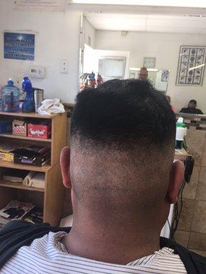 Fade style doing by Rubens in los Amigos Barber Shop