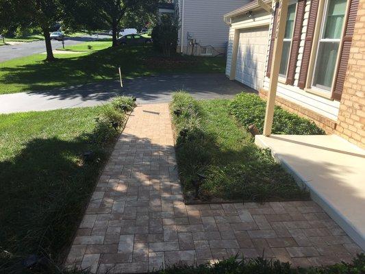 Paver front walkway in travertine color.