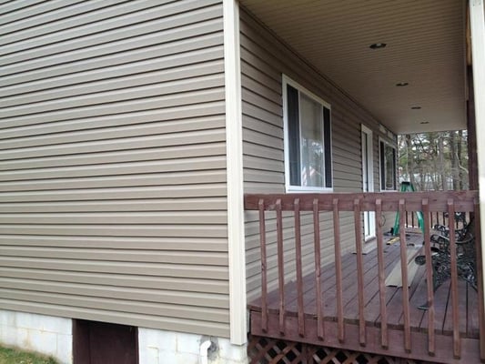 Siding and porch soffit and lights.