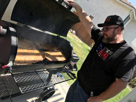 Tex checking the BBQ Spare Ribs