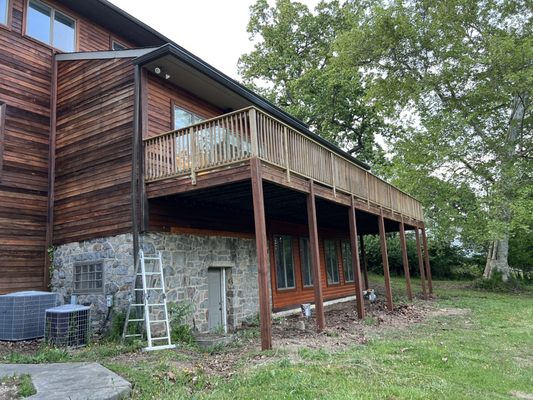 Power washed and stained siding deck and installed new siding