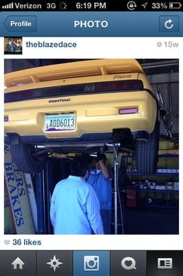 George and Furman installing my exhaust for my 1988 Fiero.