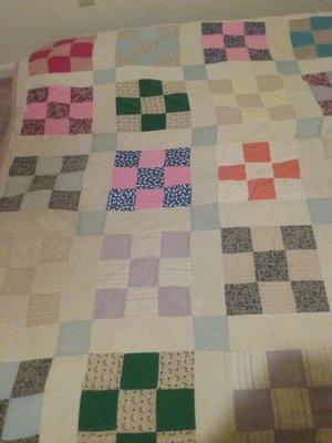 A treasured family quilt is restored.