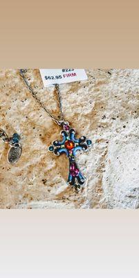 Firefly cross pendant.