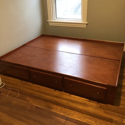 The finished pine bed frame in my bedroom, delivered and assembled!