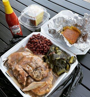 Smothered pork chops, rice, collard greens, red beans, cornbread and lemon bundt cake.