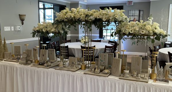 Calla lilies, hydrangeas, roses, and stock.