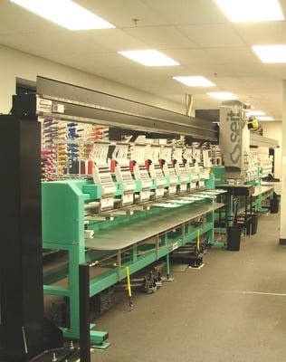 Our Tajima embroidery machines and the overhead seit laser.