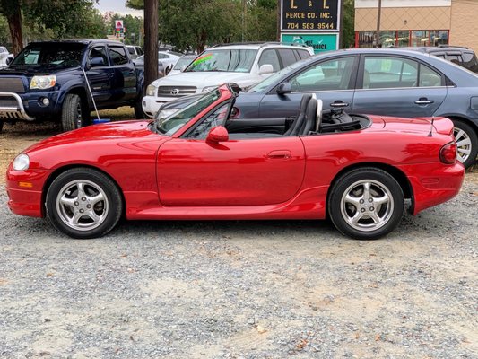 Red convertible Miata