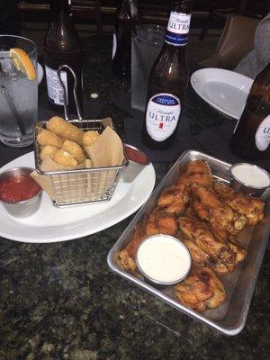 Cheese sticks, Buffalo wings, and Michelob at the Country Club. Chase And Zack are great servers!