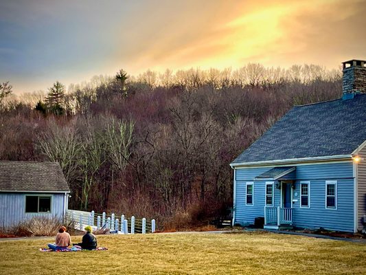 Two residents sit together in friendship as they enjoy the glow of a Wellspring sunset. Learn more: 
 https://wellspring.org/