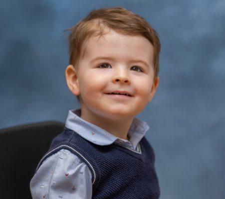 Pre-k portrait session for child in Ms. Sue's Place.