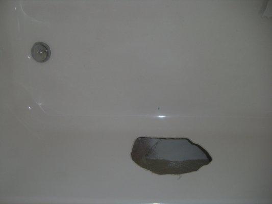 Hole in Tub Wall - Before