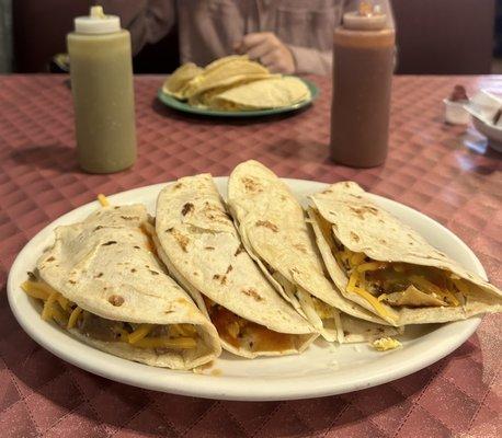 Carne guisada with cheese, chilaquiles, migas (2)